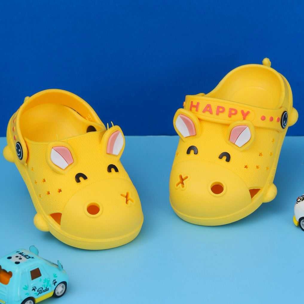 Yellow animal-themed clogs for girls against a blue background