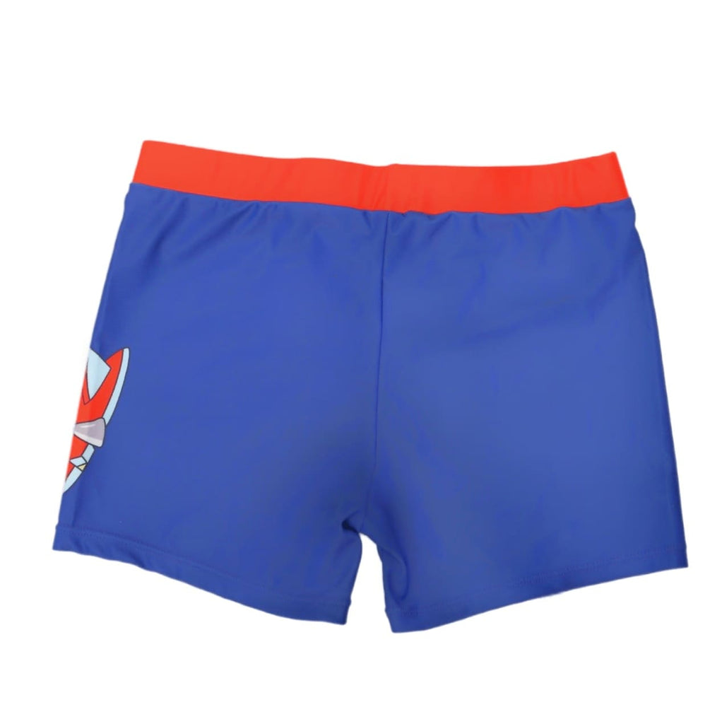 Back view of Blue swim shorts for boys with a red waistband and a playful shark tail graphic on the side