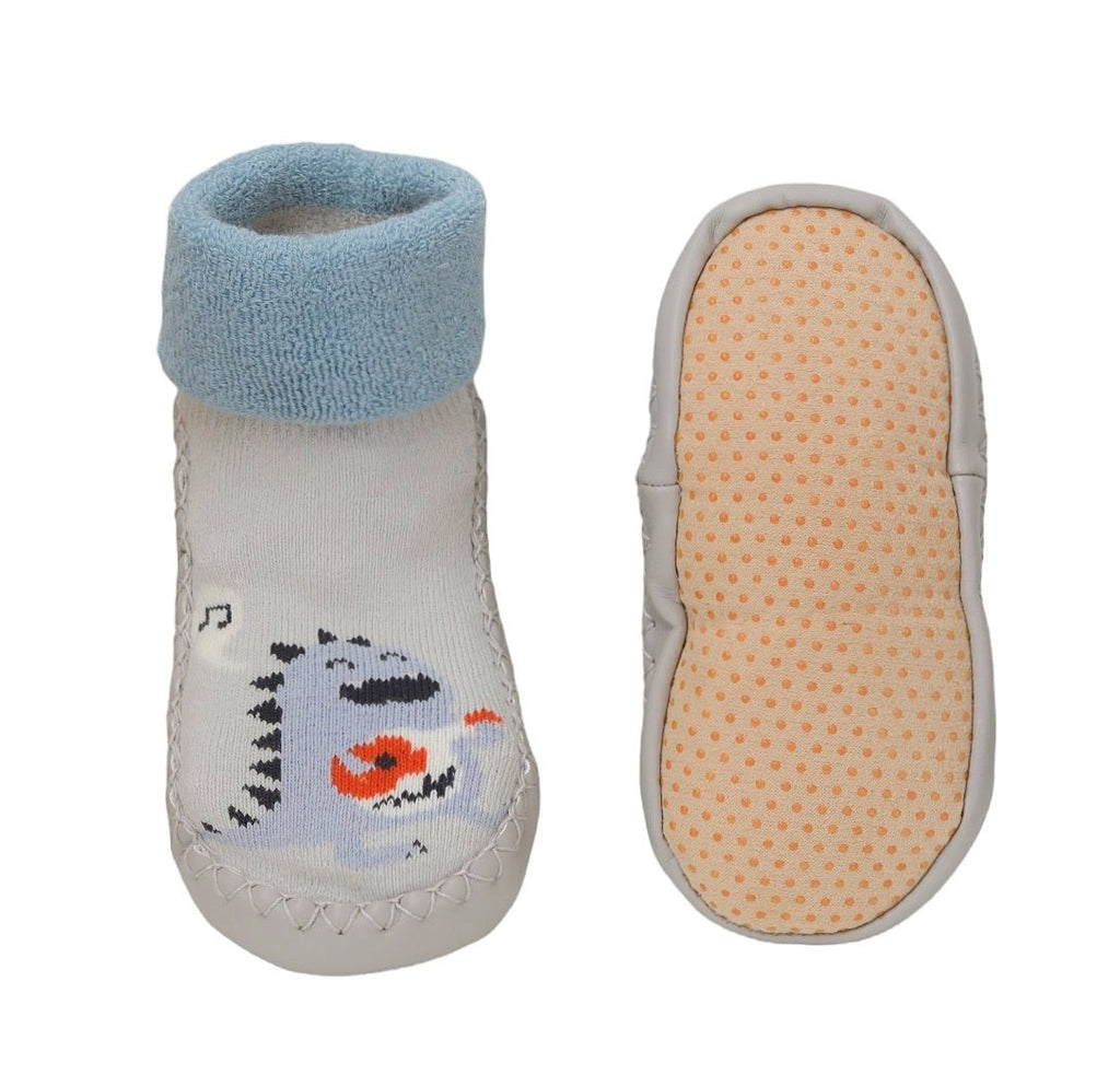 Top and bottom view of grey toddler leather socks with dinosaur print and anti-slip sole