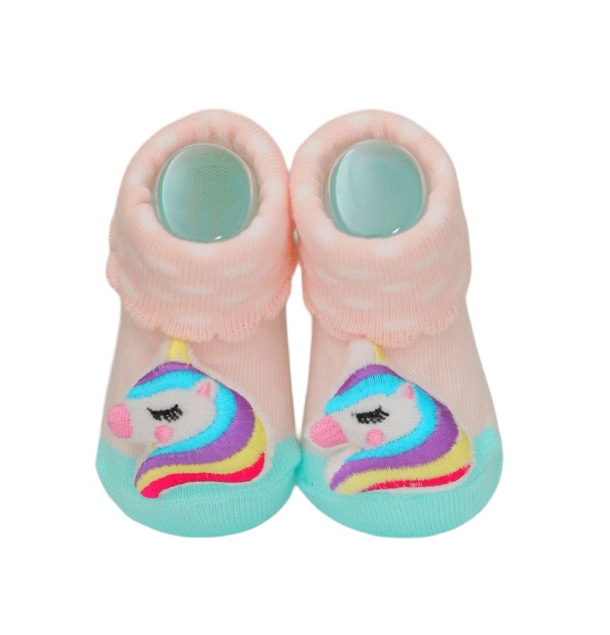 Pair of baby socks with a unicorn design and soft ribbed cuffs