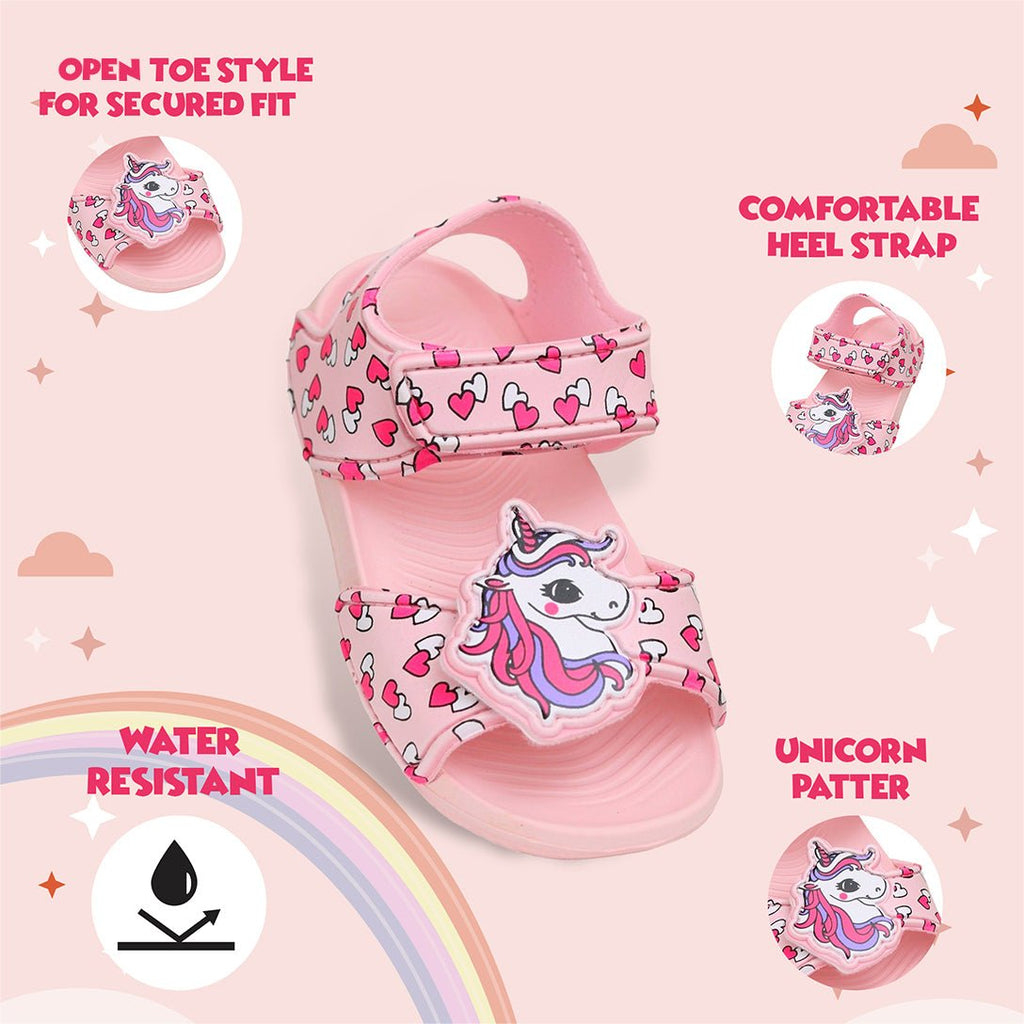 Infographic Close-up of peach unicorn sandals with heart detailing and secure strap for adventurous kids.