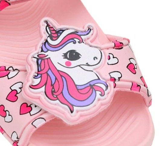 Detailed image of a unicorn appliqué on kids' sandals with heart-decorated straps in peach