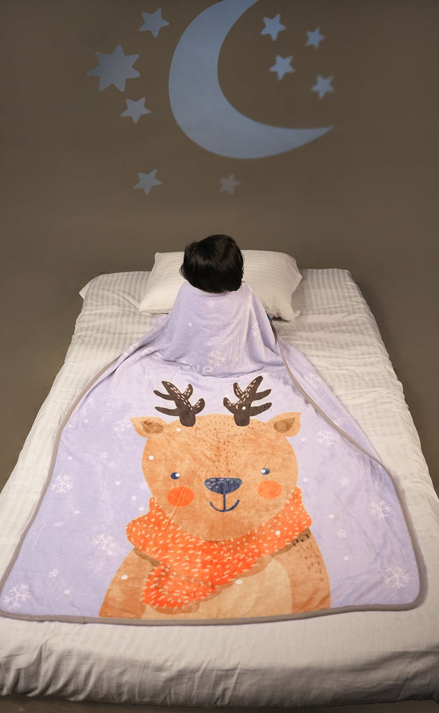 Sleeping Child Covered with Soft Yellow Bee Reindeer Blanket