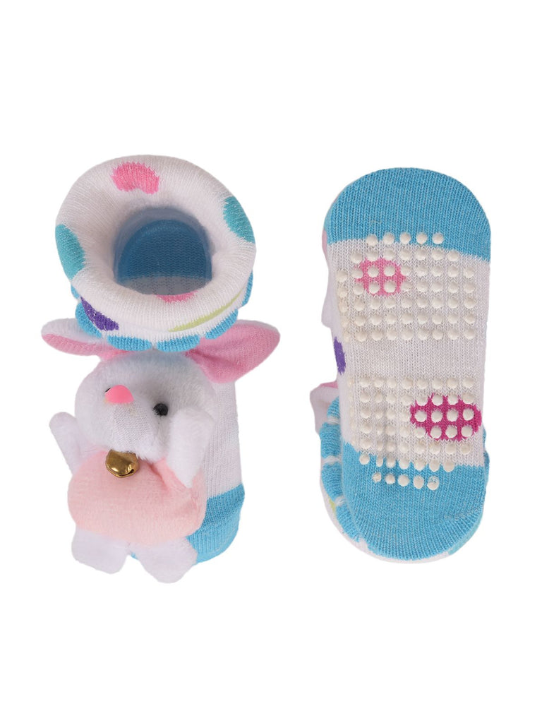 Infant socks with non-slip grips and plush bunny toy attachment, top and bottom view.