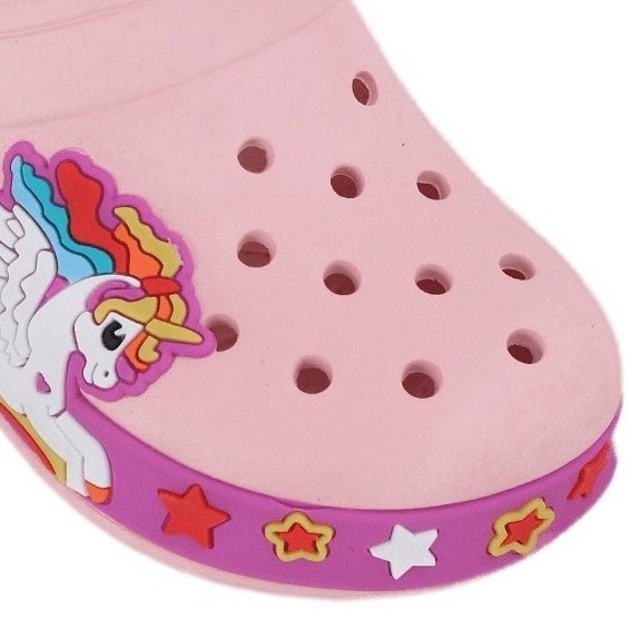 "Close-up of the front portion of a pink child's clog, showing off the unicorn motif and playful stars.