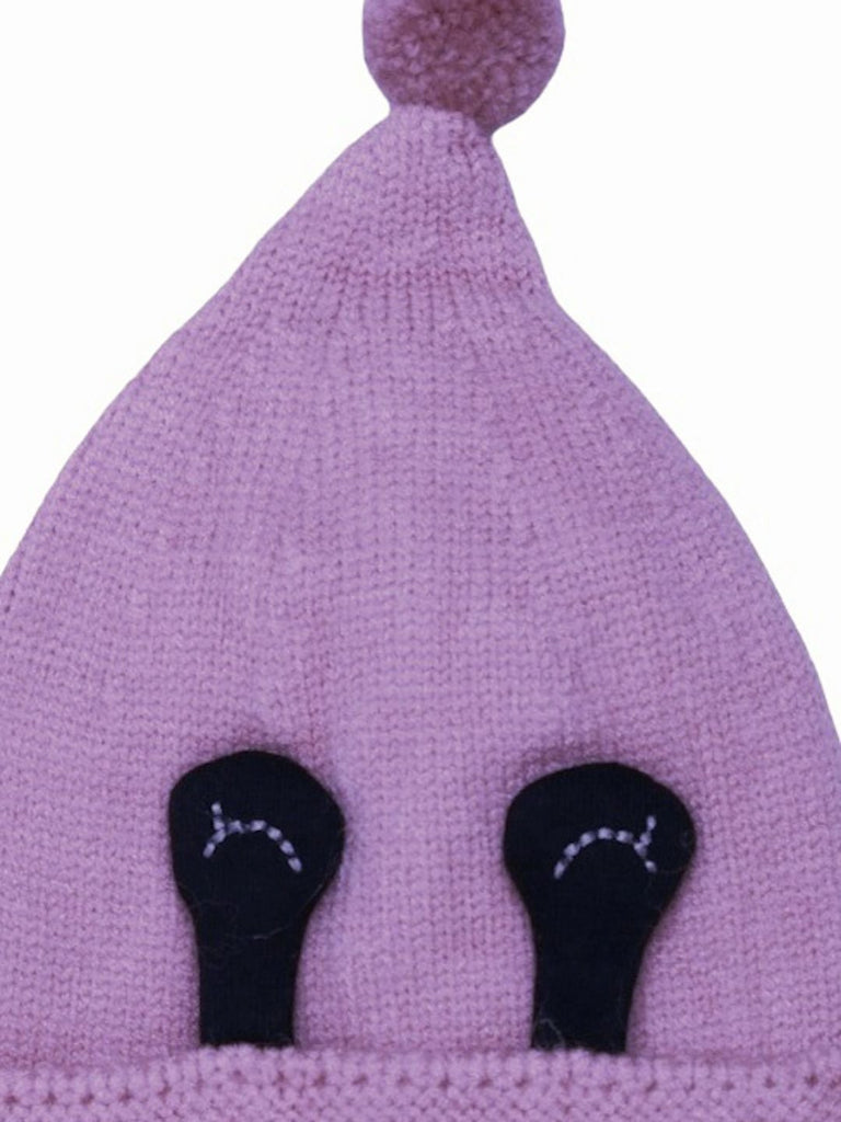 Top view of a cozy mauve pom-pom beanie hat with eye applique for girls, 1-2 years old.