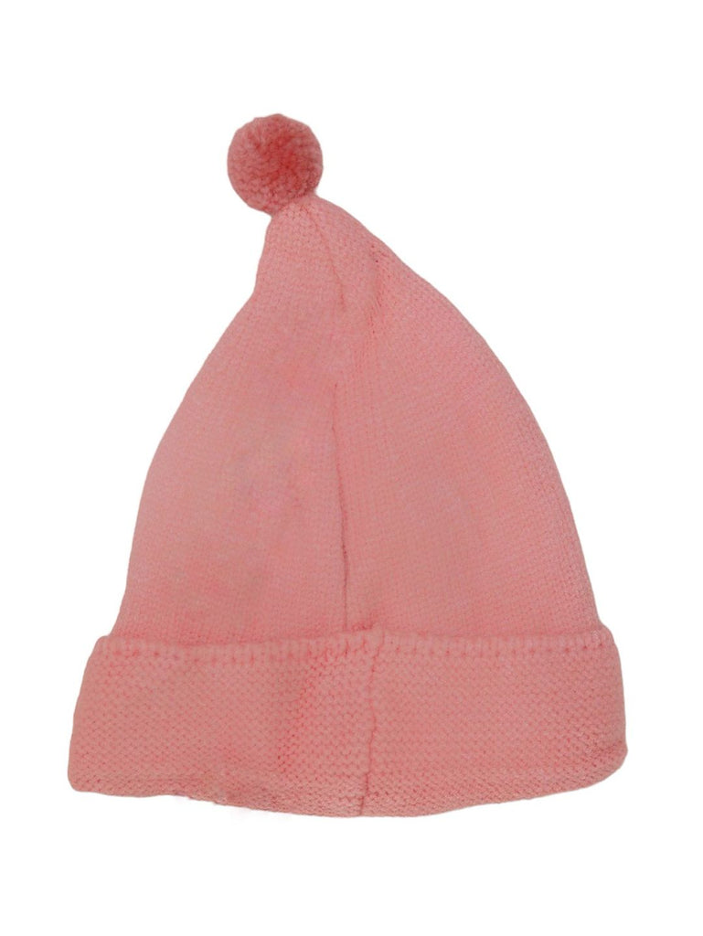 Side view of a playful pink pom-pom beanie with eye details for little girls.