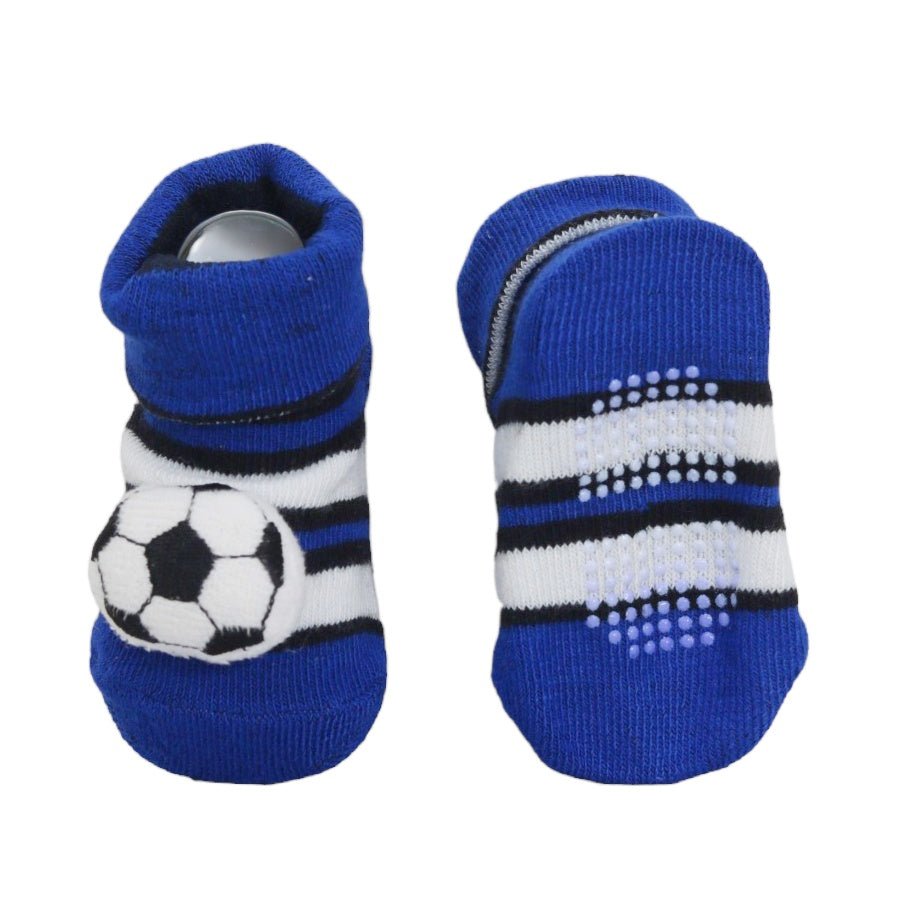 Pair of blue baby socks with football design and non-slip soles displayed.