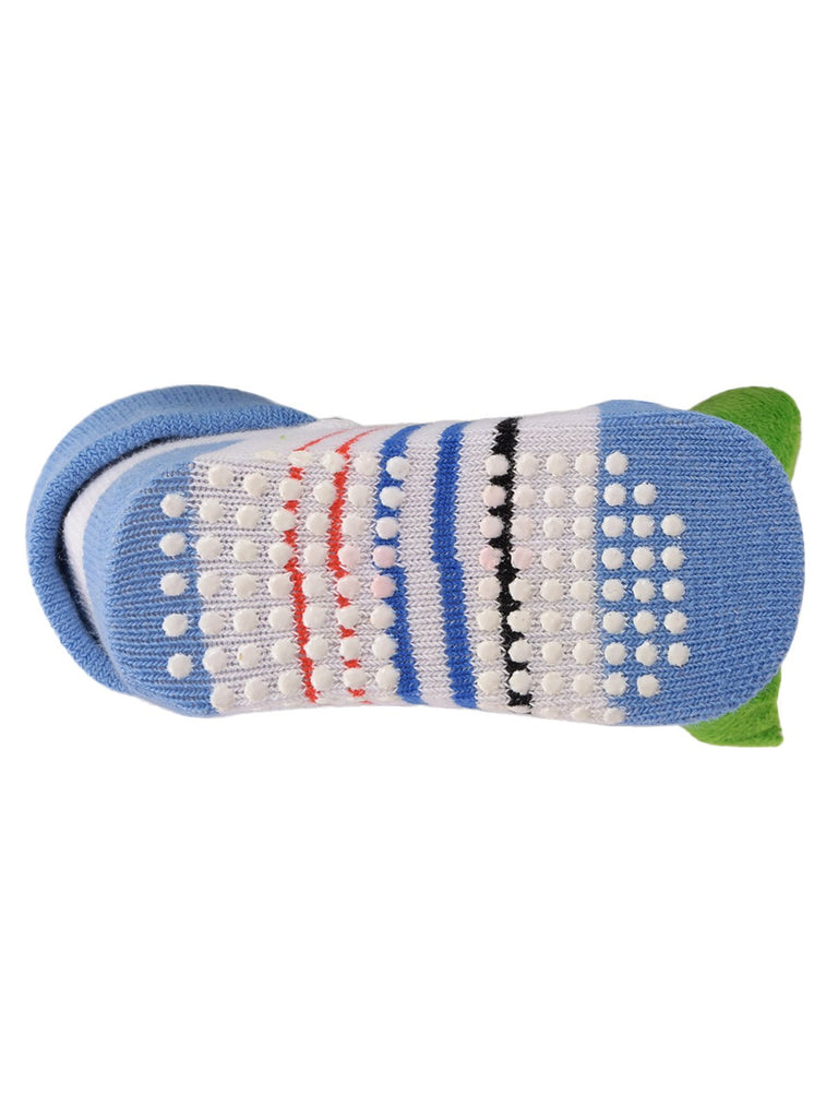Underside of children's playful socks with bee toy, highlighting the non-slip rubber outsole