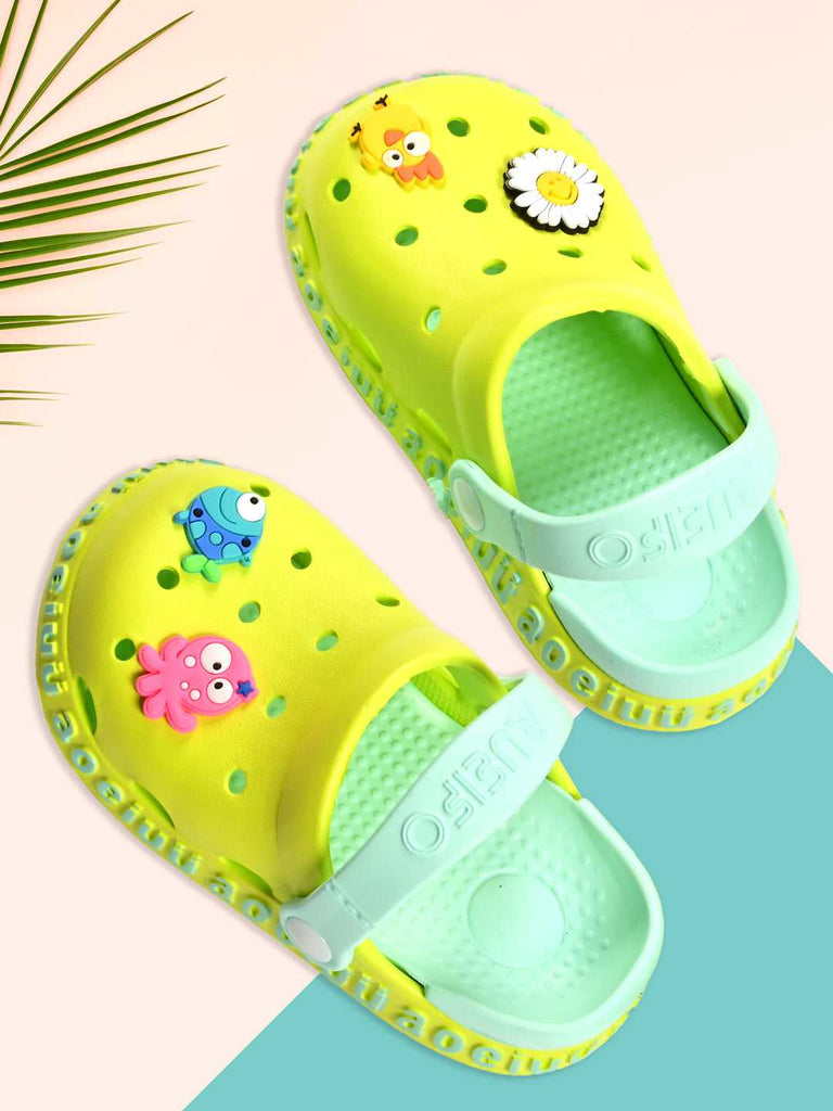 Bright Lime Green Kids' Clogs with Colorful Charms and Adjustable Heel Strap on Pastel Background