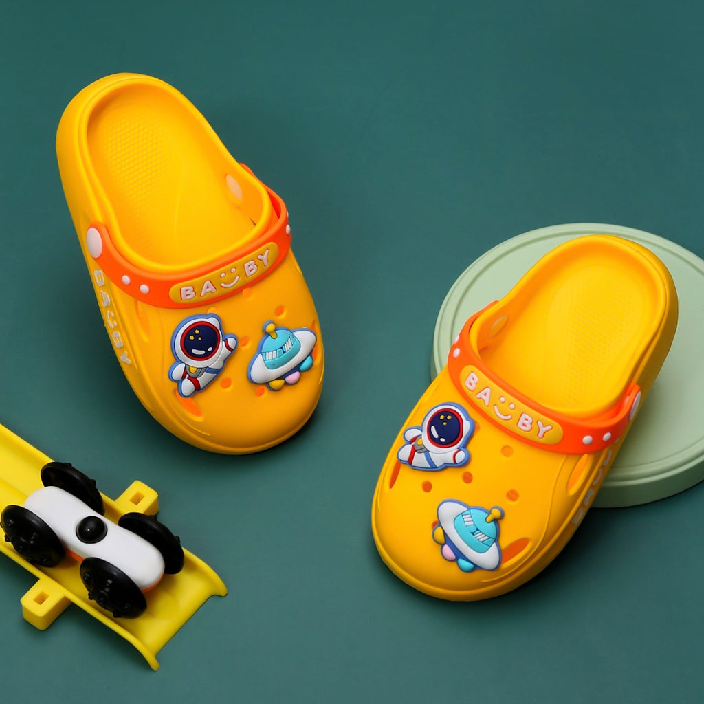 Yellow space-themed clogs for kids with astronaut and spaceship motifs