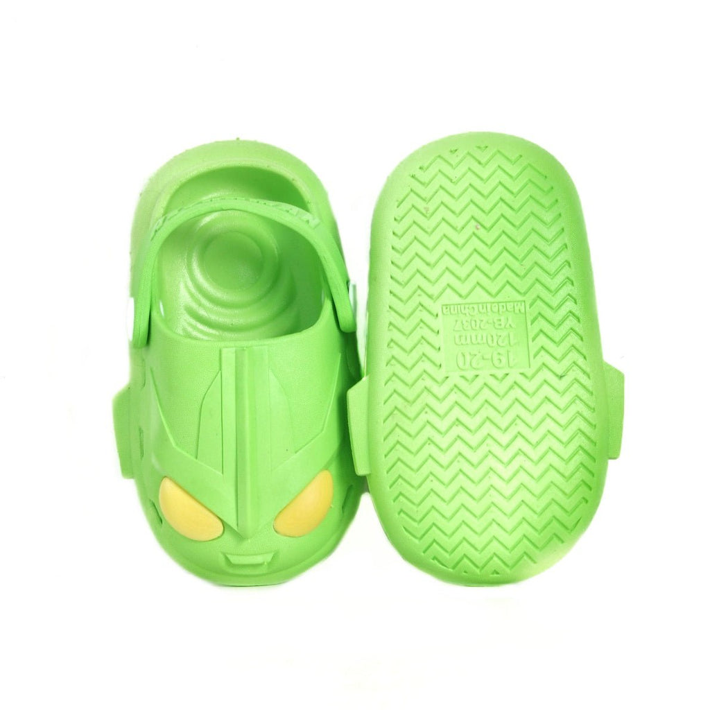 Top and bottom view of Green Alien Clogs, highlighting the anti-slip sole design.