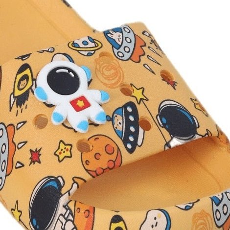 Close-Up of Astronaut and Space Elements on Kids' Yellow Slides