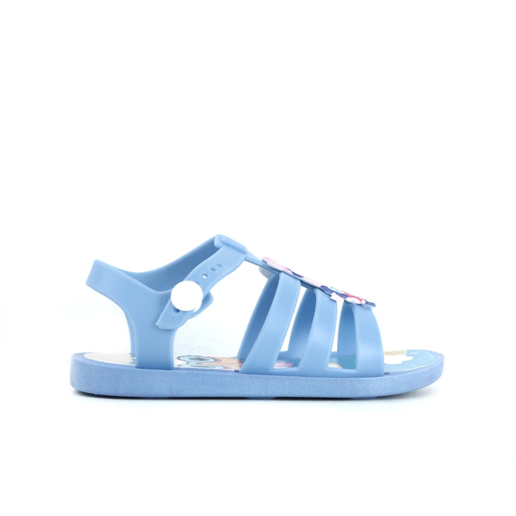 Side view of George Island Life blue sandals for kids showcasing the playful character details.