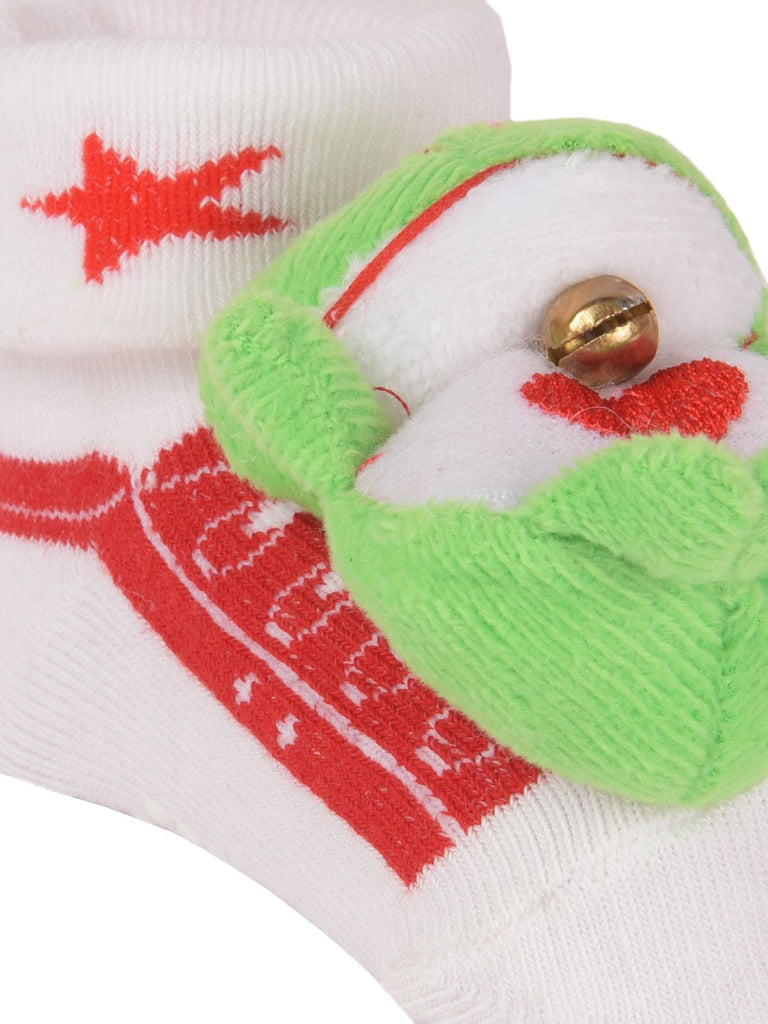 Close-Up of Plush Frog Toy on Stuffed Toy Sock with Embroidered Eyes and Smiling Mouth