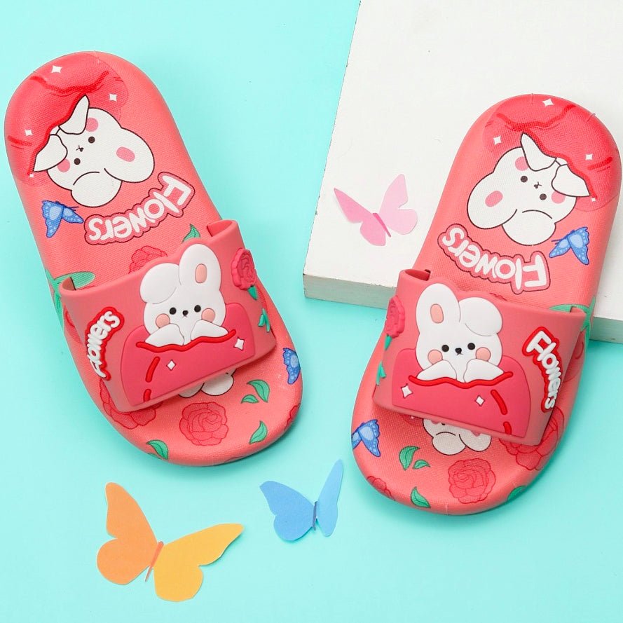 Adorable white bunny applique on bubblegum pink slides with a floral background, perfect for adding a pop of fun to your day by Yellow Bee
