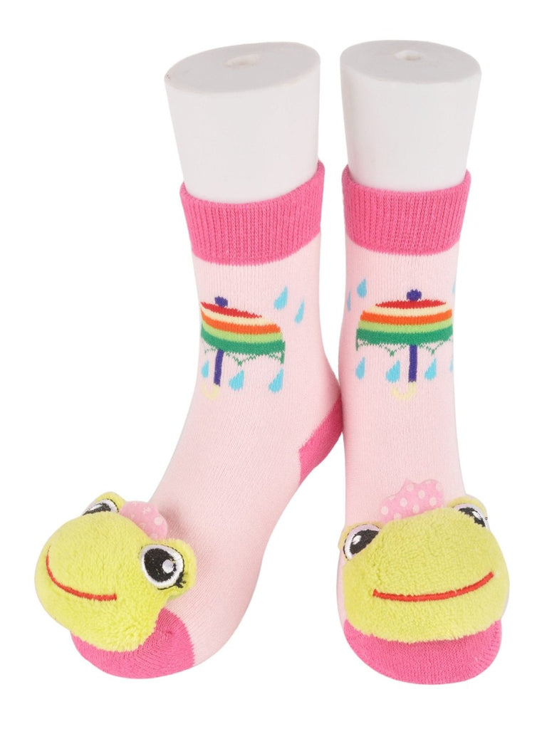 Adorable children's socks with frog plush toy design by Yellow Bee - front view on display.