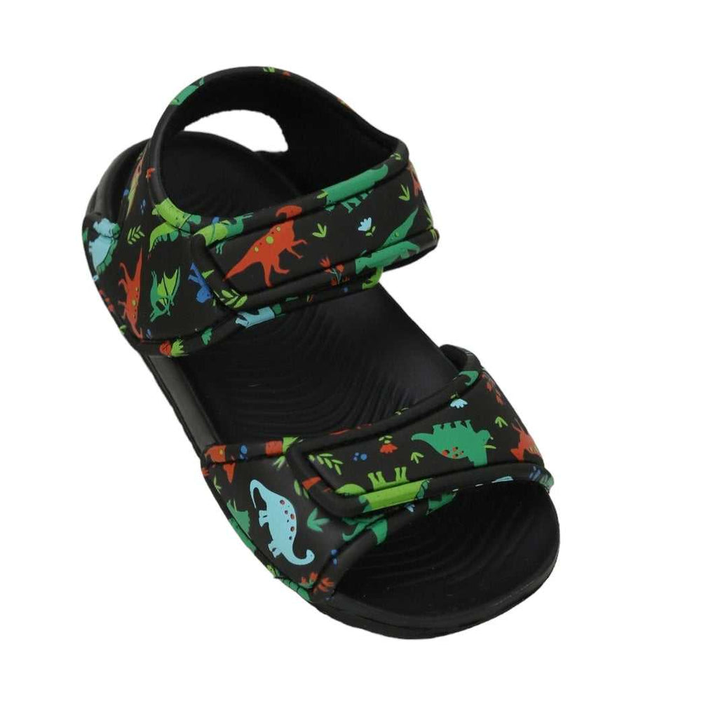 Single black sandal with vibrant all-over dinosaur print for adventurous kids