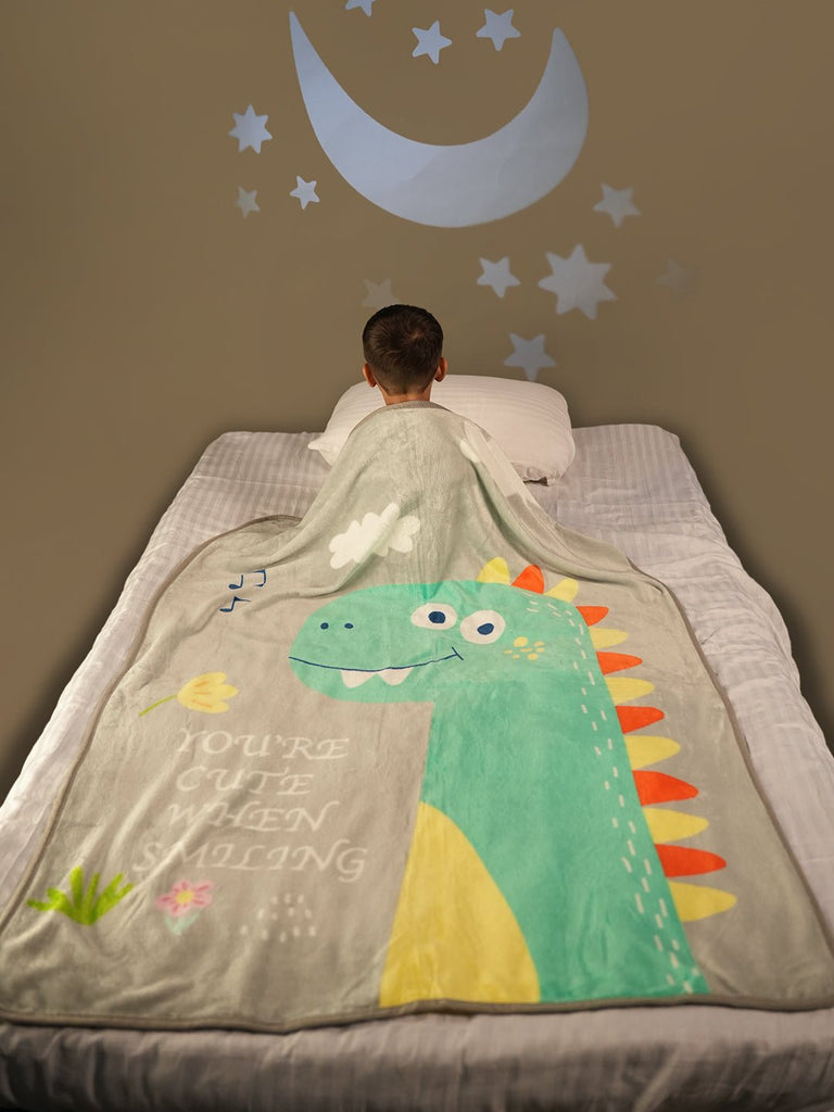 Back View of Boy Under the Warm Yellow Bee Dino Blanket – Secure Stitching