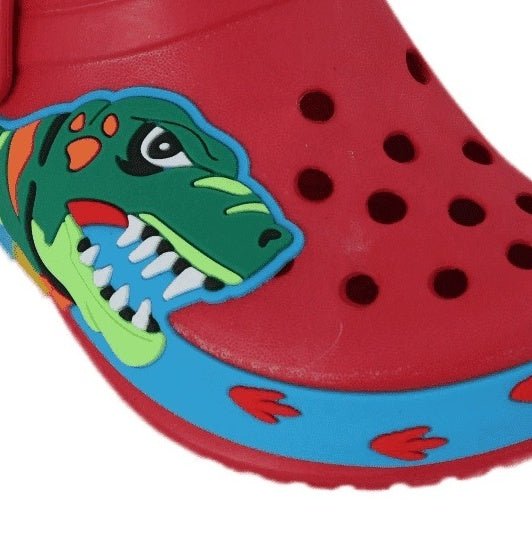 Close-up of kids' clogs featuring a fierce dinosaur, designed for comfort and style.