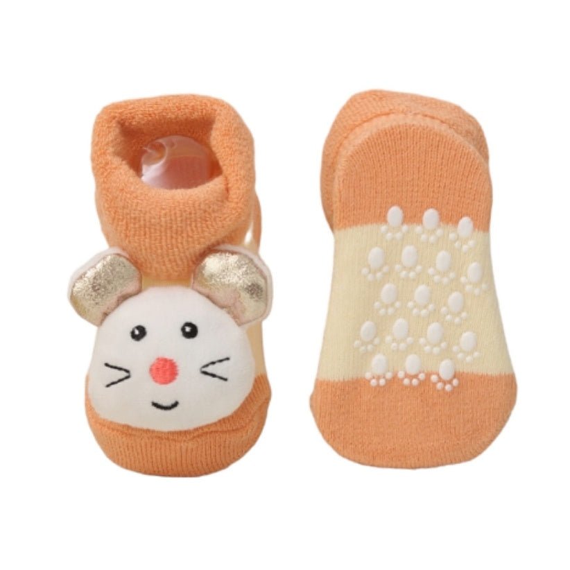 Image of the anti-slip sole on Yellow Bee's orange mouse stuffed toy socks for babies, ensuring safety during play.