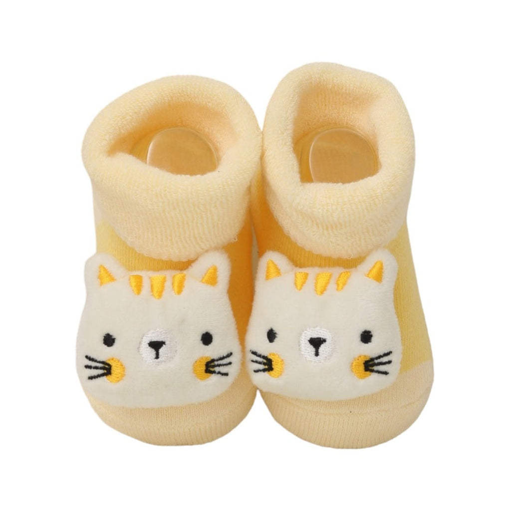 Image of Yellow Bee's yellow kitty stuffed toy socks for babies, front view showing the adorable cat face.
