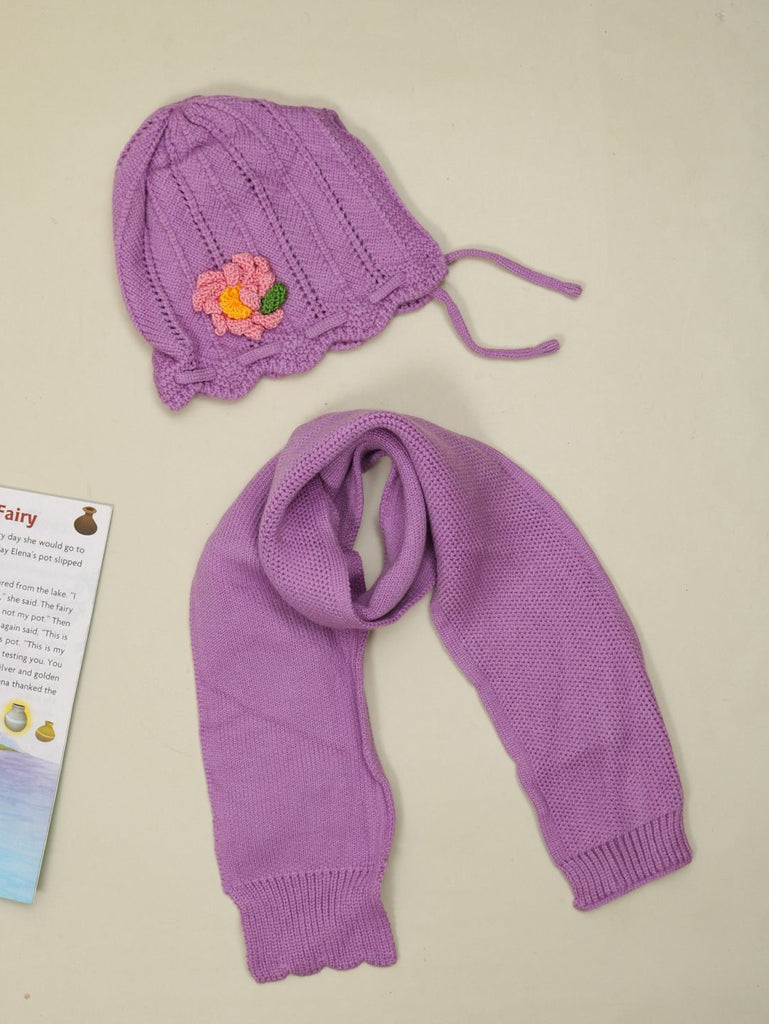 Purple knitted beanie with floral accent and matching muffler set for girls aged 1-2 years.