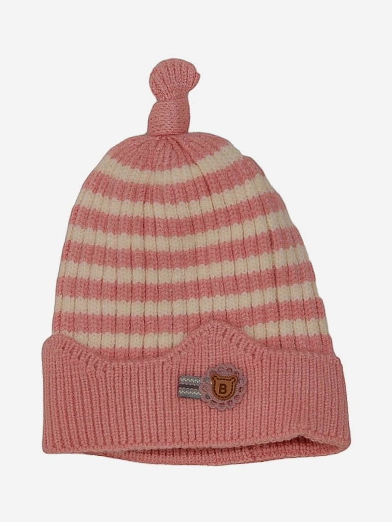 Front view of the dark pink winter beanie for girls, displaying the white stripes and cute badge detail.