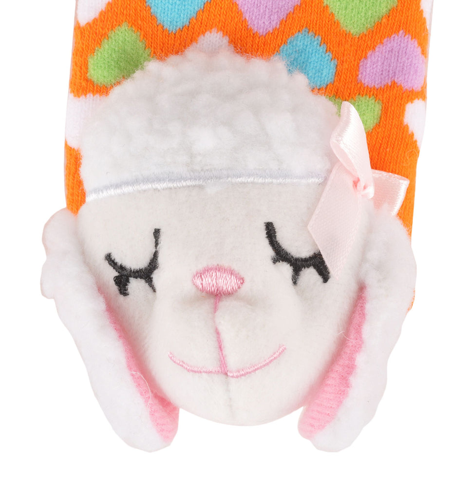 Adorable lamb toy socks for toddlers in bright orange color - isolated on white.