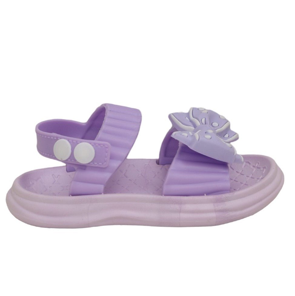 Side angle showcasing the purple bow detail sandal's soft straps and sturdy sole for active kids.