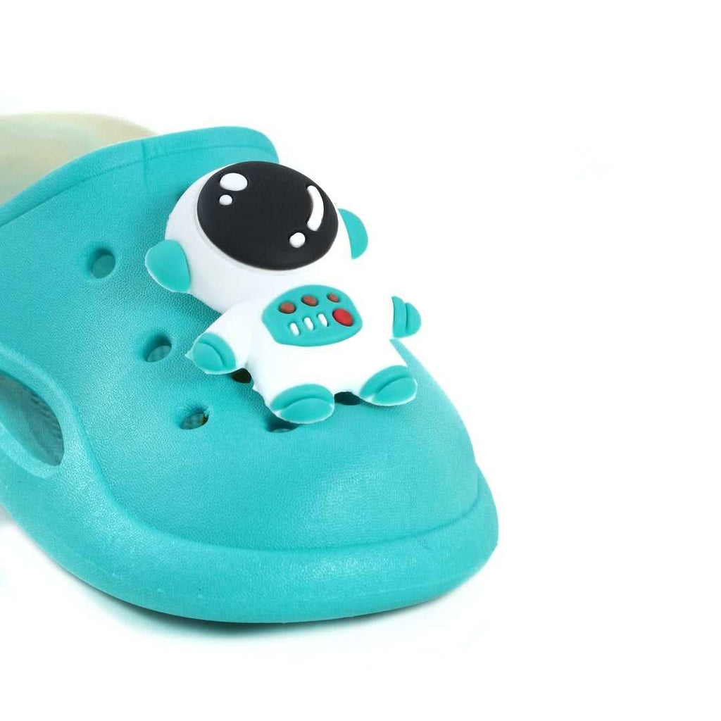 Close-up of the playful space-themed decorations on the toe of the aqua kids' clogs.