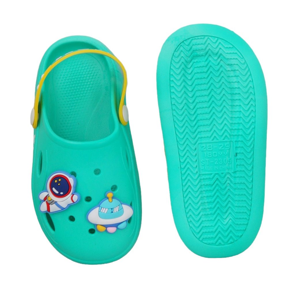 Bottom view of green space motif toddler clogs with a non-slip sole.