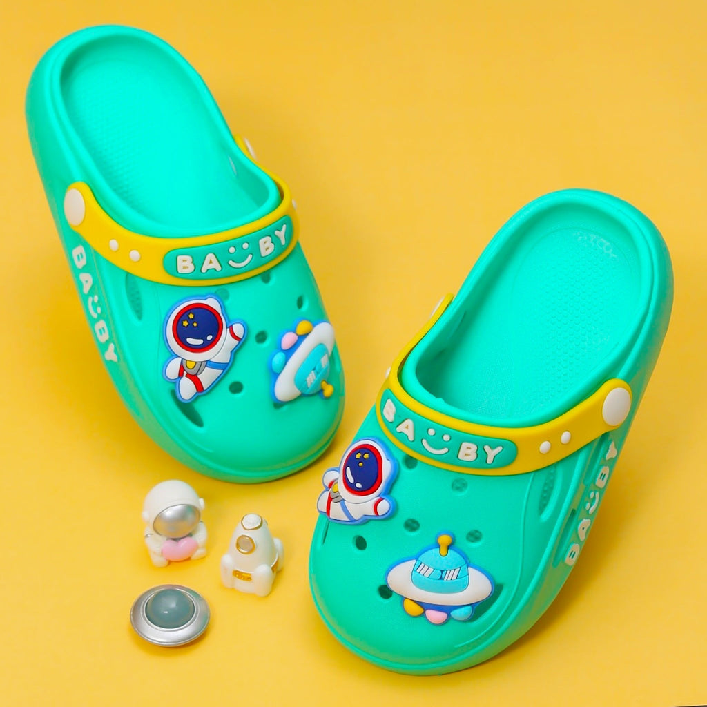 Vibrant green space-themed clogs for toddlers with astronaut graphics