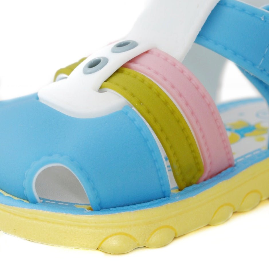 Close-up of the front strap on blue comfort sandals with secure velcro fastening