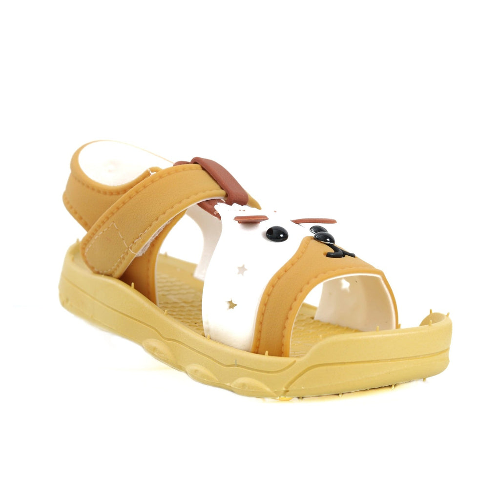 Angled view of yellow puppy sandals showing the secure fit and adorable design features.