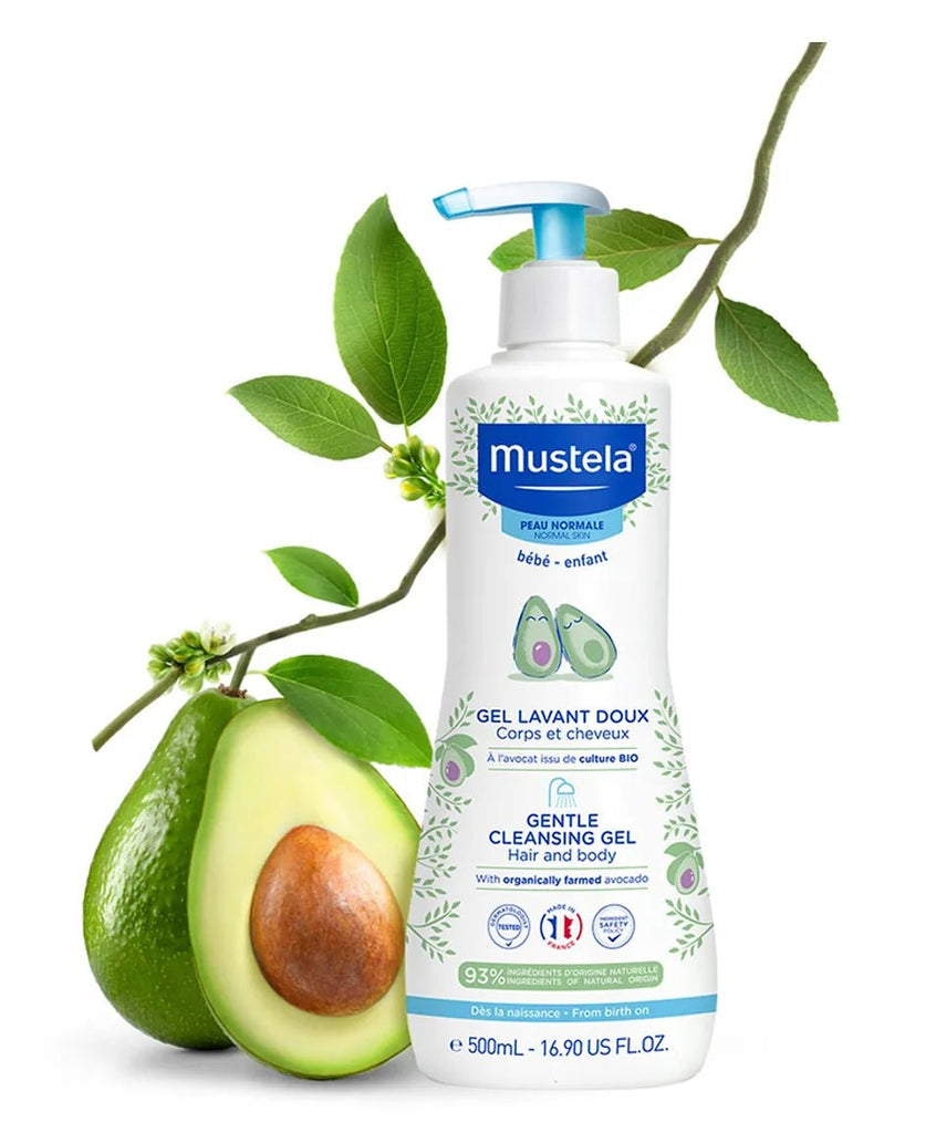 Mustela Gentle Cleansing Gel bottle with a fresh avocado, illustrating the natural essence