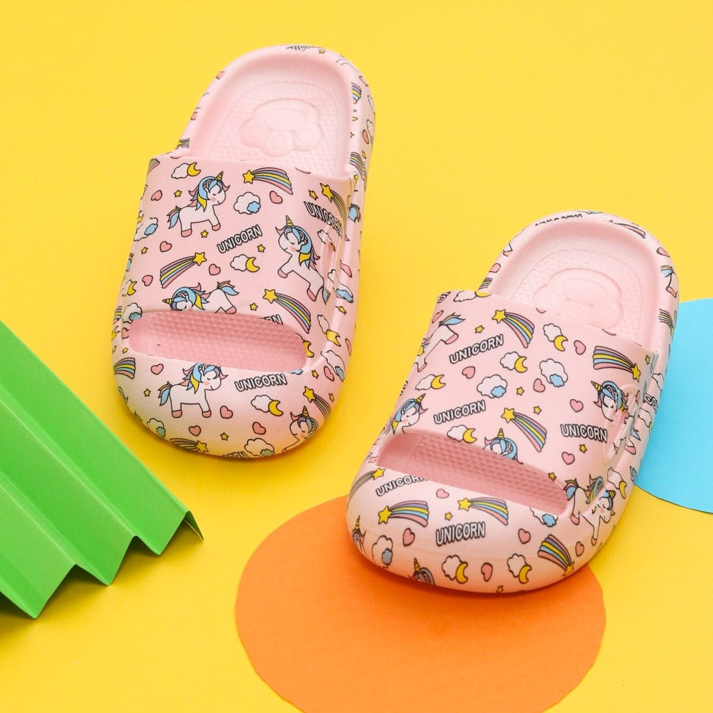 Top view of blush pink unicorn-themed slides by Yellow Bee
