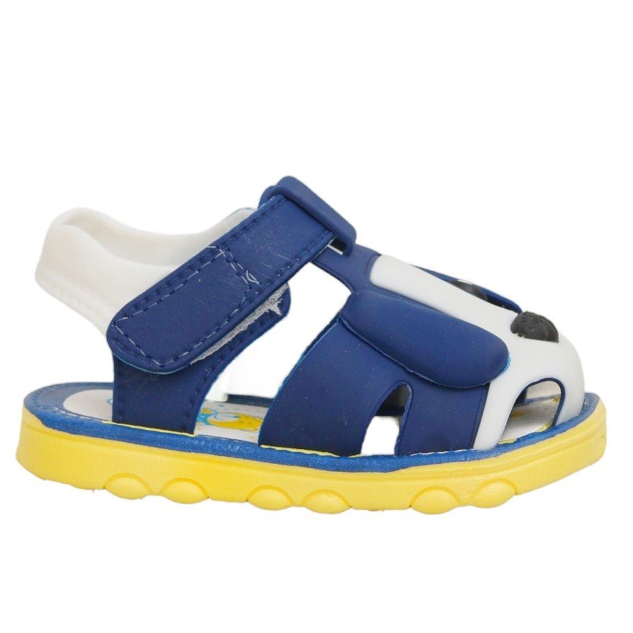Profile view of blue and yellow children's sandal with cute puppy face applique.