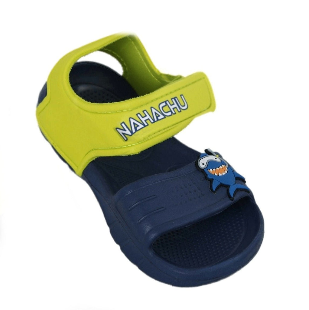 Angled view of a child's navy shark sandal with a cheerful shark face and secure strap.