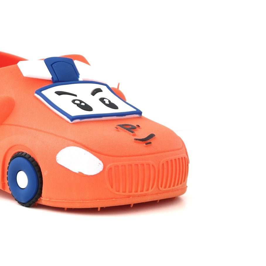 Front view of the orange car pattern clogs highlighting the playful face design.