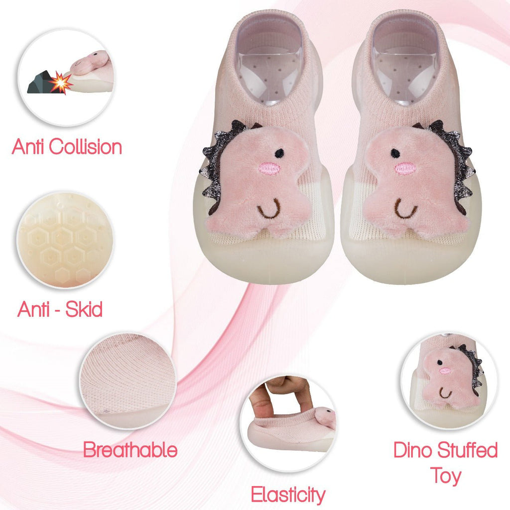 Soft pink dino stuffed toy shoe socks with enhanced grip and comfort