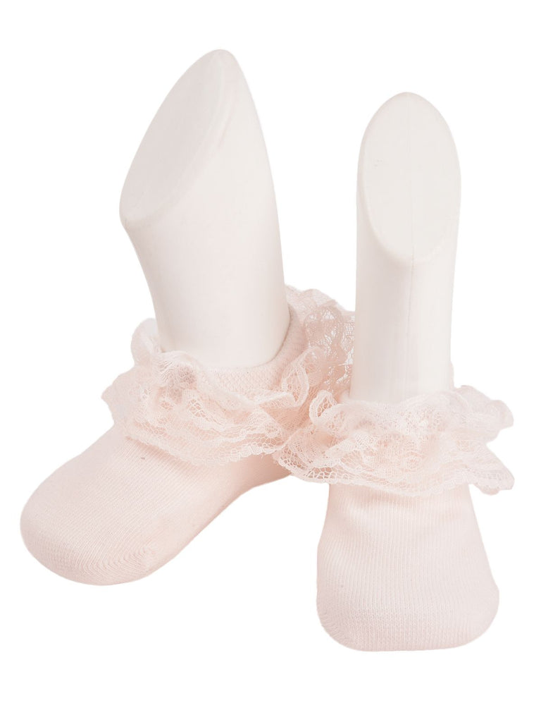 Elegant Pink Lace Frill Socks on Mannequin Feet Against White Background