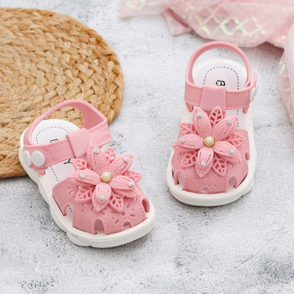 Pair of pink flower-embellished children's sandals 