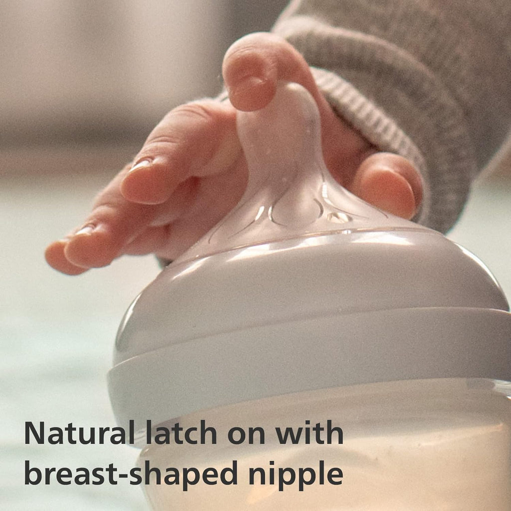 Natural latch with Philips Avent breast-shaped nipple on baby bottle
