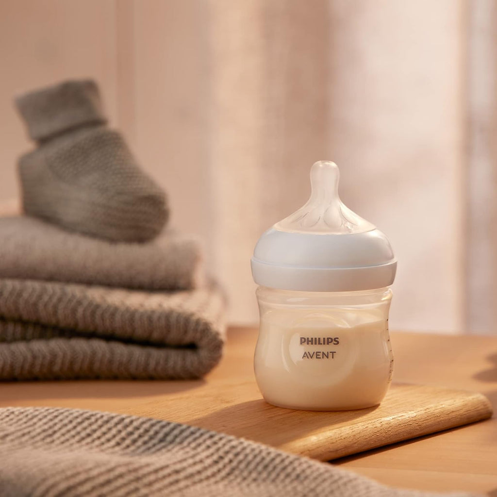 Philips Avent Natural Response Baby Bottle on a cozy home setting