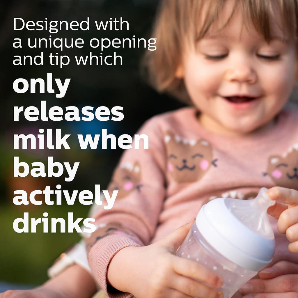 Child happily using Philips Avent SCY903/67, highlighting the milk release mechanism for active drinking.