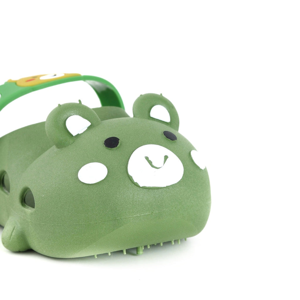 Green clog with adorable bear face design and smiling expression for kids, featuring a sturdy strap for secure fit.