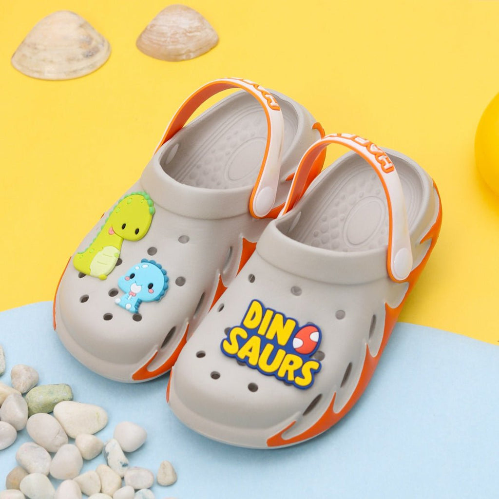 Colorful kids' clogs with a cute dinosaur design, perfect for playful stompers.