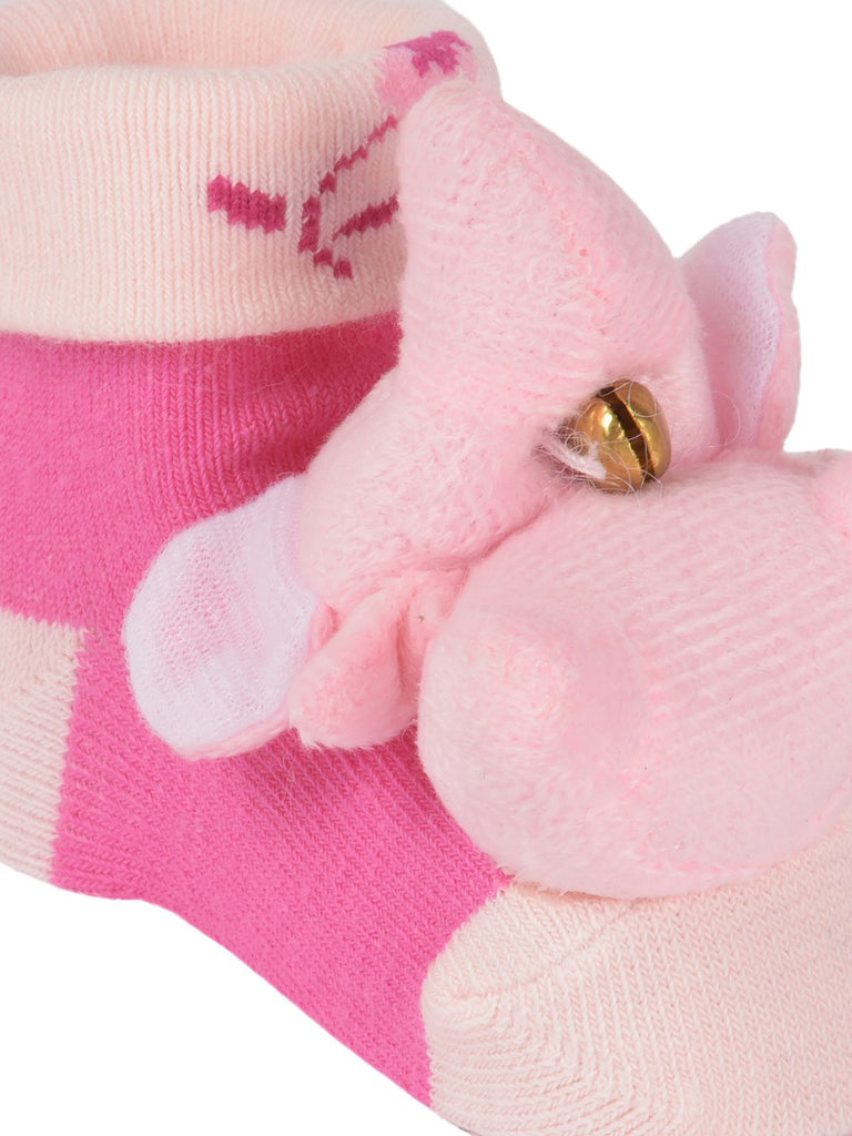 Close-up of the plush elephant detail on Yellow Bee's cozy baby socks with anti-skid bottom