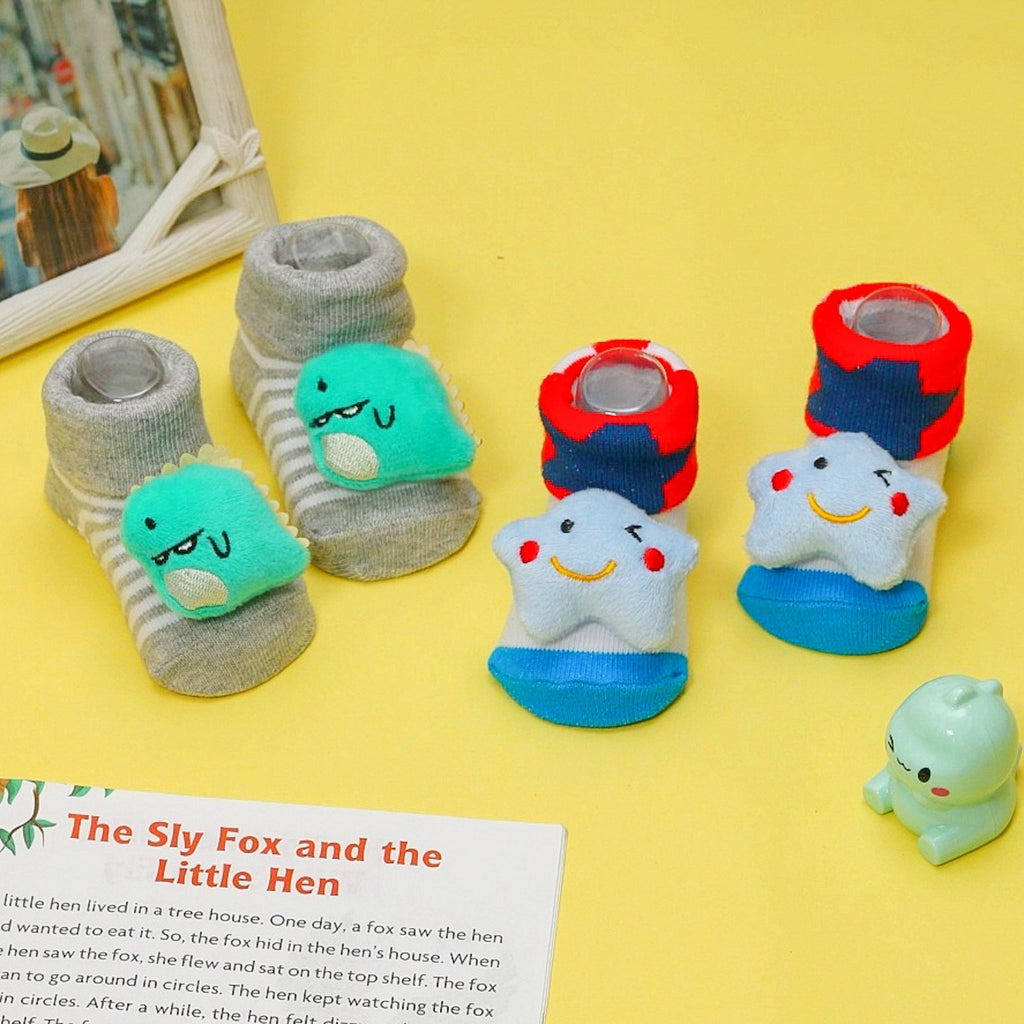 Stuffed toy socks set with pink cloud and mint green ice cream characters on a playful background